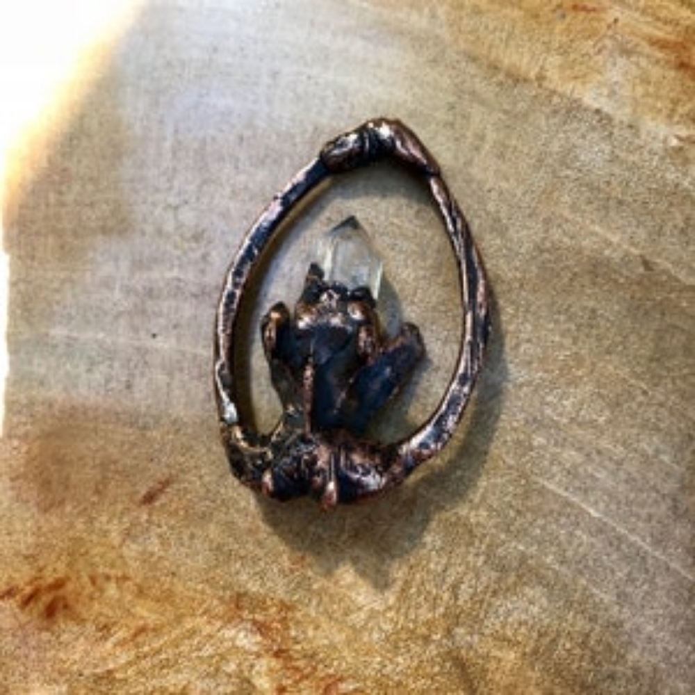 Clear quartz and Animal bones talisman by Oddwitch